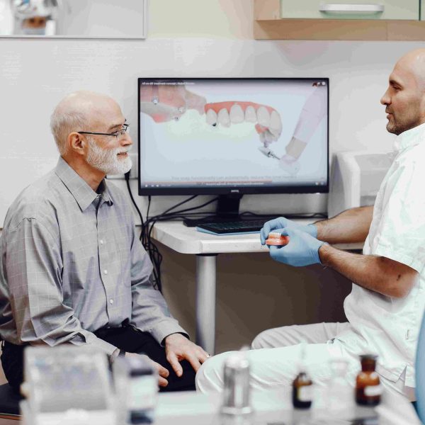 old-man-sitting-dentist-s-office (1)_11zon